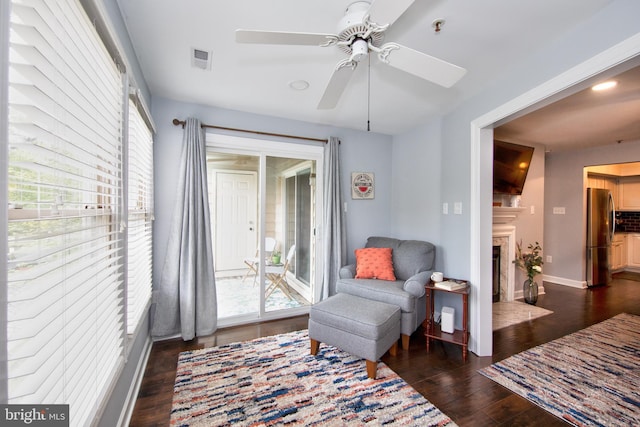 904 Martell Ct Unit 904-E, Bel Air, MD 21014 - sitting room with a ceiling fan, dark wood-style floors, baseboards, and a fireplace with flush hearth