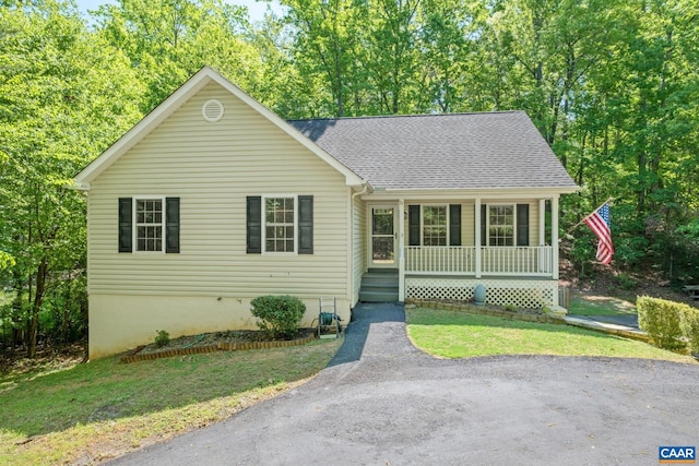 25 S Bearwood Dr, Palmyra, VA 22963 - ranch-style home featuring roof with shingles and covered porch