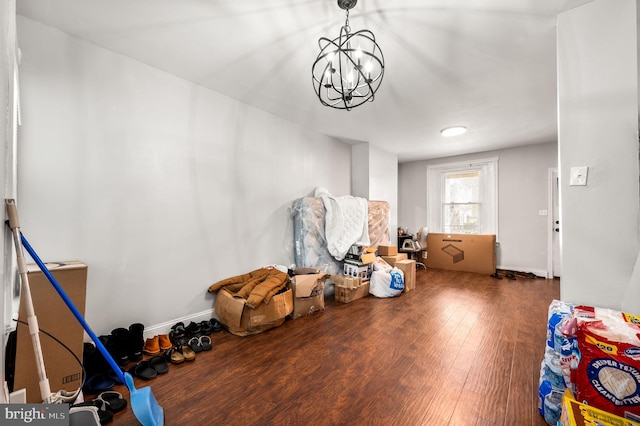 interior space with an inviting chandelier and wood finished floors
