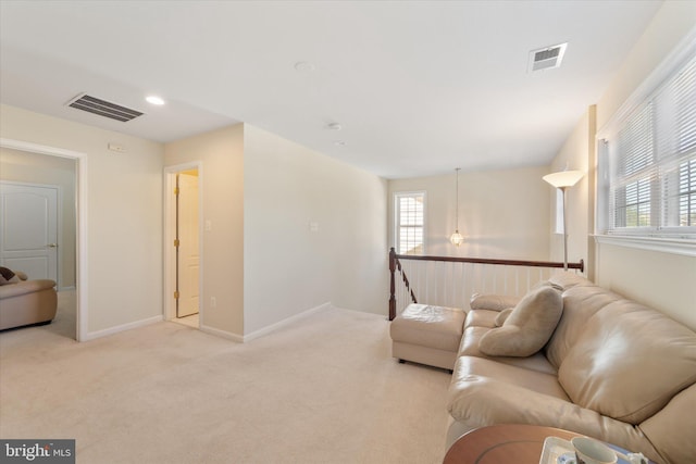 44516 Blueridge Meadows Dr, Ashburn, VA 20147 - living room with carpet floors, baseboards, and visible vents