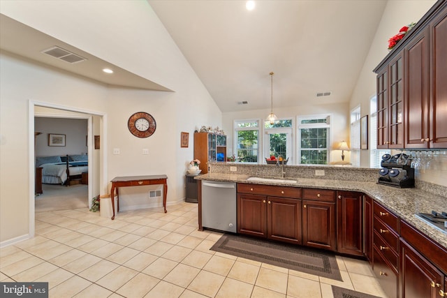 44516 Blueridge Meadows Dr, Ashburn, VA 20147 - kitchen with appliances with stainless steel finishes, a sink, high vaulted ceiling, a peninsula, and visible vents