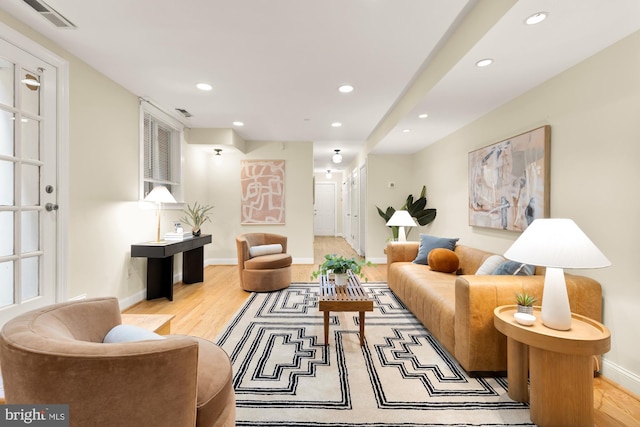 1320 Park Rd NW Unit 1, Washington, DC 20010 - living area featuring recessed lighting, wood finished floors, and baseboards