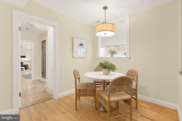 1320 Park Rd NW Unit 1, Washington, DC 20010 - dining room with light wood finished floors and baseboards