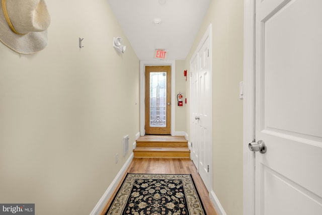 1320 Park Rd NW Unit 1, Washington, DC 20010 - entryway with light wood-style flooring and baseboards