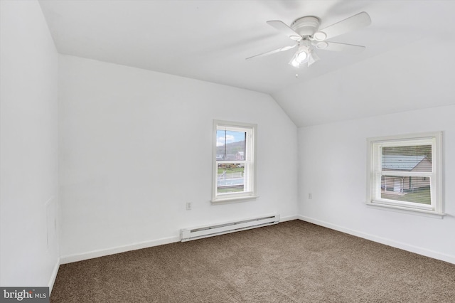 bonus room featuring a ceiling fan, vaulted ceiling, baseboards, a baseboard heating unit, and carpet flooring
