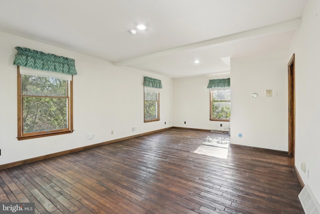 empty room with dark wood-style flooring, baseboards, recessed lighting, and visible vents