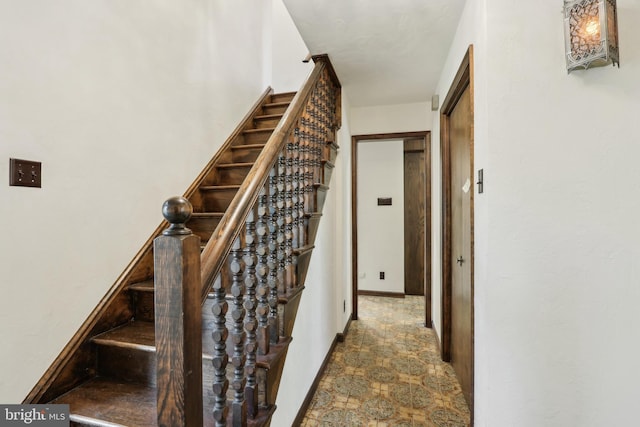 stairway with baseboards