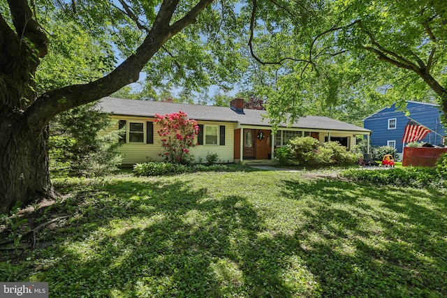 947 Old York Rd, Hightstown, NJ 08520 - single story home with a front yard and a chimney