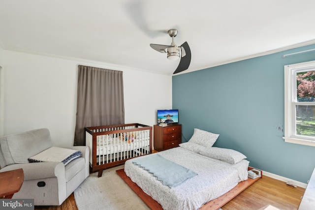 947 Old York Rd, Hightstown, NJ 08520 - bedroom featuring wood finished floors, baseboards, a ceiling fan, and ornamental molding
