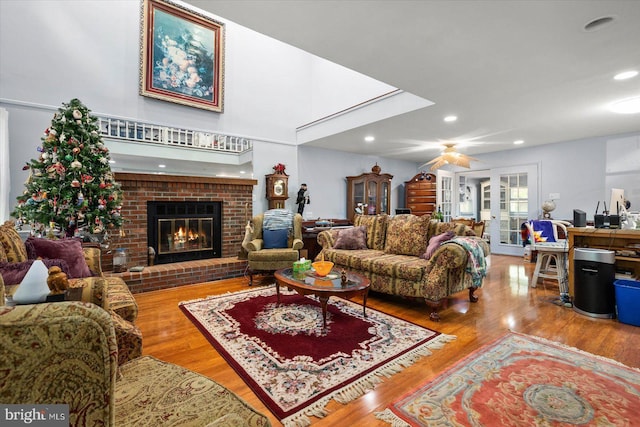 9 Sailors Way, Berlin, MD 21811 - living area featuring recessed lighting, a brick fireplace, and wood finished floors