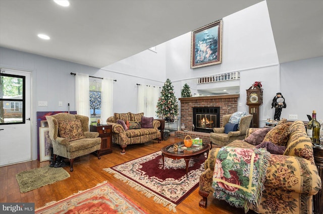 9 Sailors Way, Berlin, MD 21811 - living area with a brick fireplace, recessed lighting, and wood finished floors