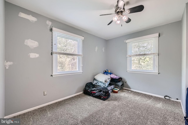 3646 Double Rock Ln, Baltimore, MD 21234 - unfurnished bedroom with baseboards, multiple windows, carpet, and a ceiling fan