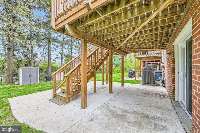 3646 Double Rock Ln, Baltimore, MD 21234 - view of patio / terrace with stairway, an outdoor structure, central AC unit, and a shed