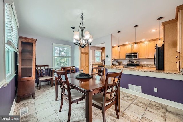 3646 Double Rock Ln, Baltimore, MD 21234 - dining area with baseboards, an inviting chandelier, and visible vents