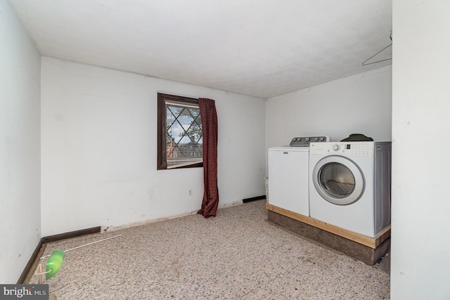 laundry area with laundry area and washer and dryer