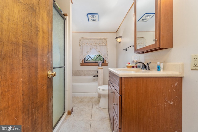 bathroom with a garden tub, tile patterned flooring, a shower stall, vanity, and toilet