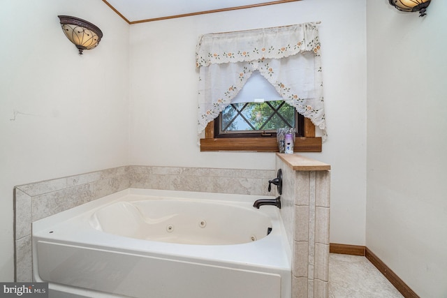 full bath featuring baseboards and a jetted tub