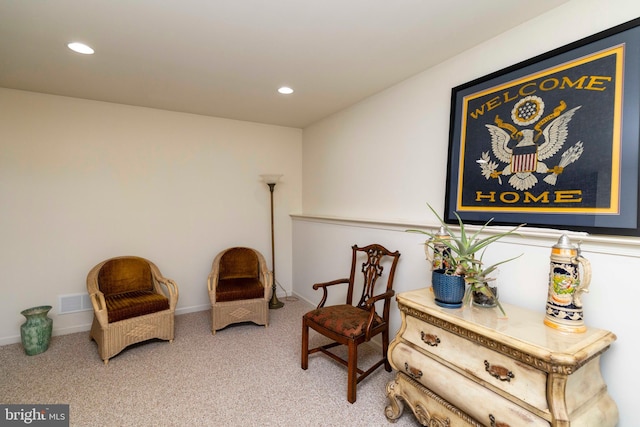 sitting room with recessed lighting, carpet flooring, baseboards, and visible vents