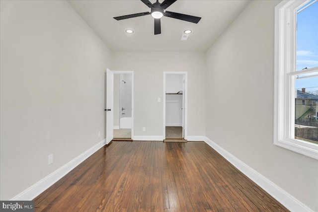 605 Northside Ave, Richmond, VA 23222 - unfurnished bedroom with recessed lighting, baseboards, a spacious closet, dark wood-style floors, and a closet