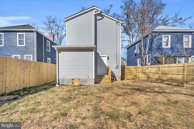605 Northside Ave, Richmond, VA 23222 - rear view of house featuring a yard, a fenced backyard, and entry steps