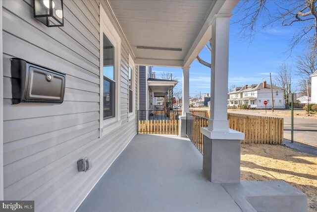605 Northside Ave, Richmond, VA 23222 - view of patio with a residential view and covered porch