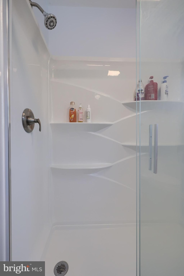 full bath featuring a stall shower