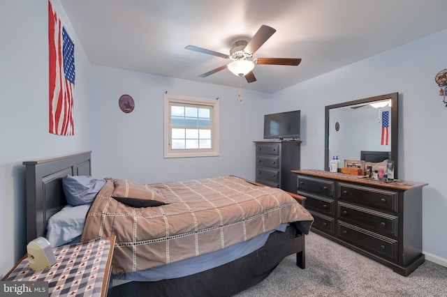 bedroom with baseboards, carpet, and ceiling fan