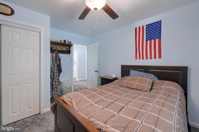 bedroom with baseboards, ceiling fan, and carpet