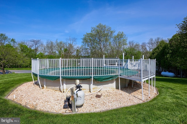 view of pool featuring a fenced in pool and a yard