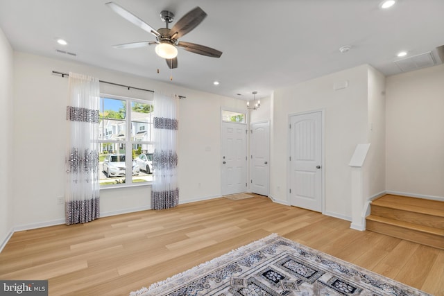 spare room with visible vents, wood finished floors, baseboards, recessed lighting, and a ceiling fan
