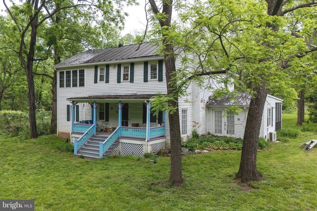 3909 Stoney Creek Rd, Edinburg, VA 22824 - view of front of home featuring a porch, a front yard, and central air condition unit