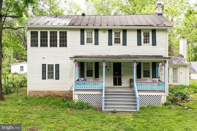 3909 Stoney Creek Rd, Edinburg, VA 22824 - view of front facade featuring a chimney, covered porch, and a front lawn