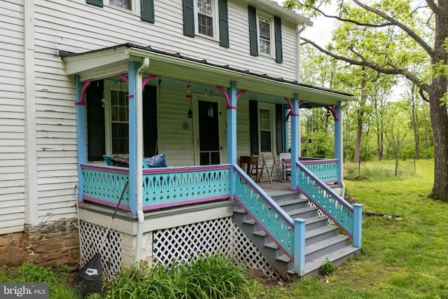 3909 Stoney Creek Rd, Edinburg, VA 22824 - doorway to property featuring a porch and a lawn