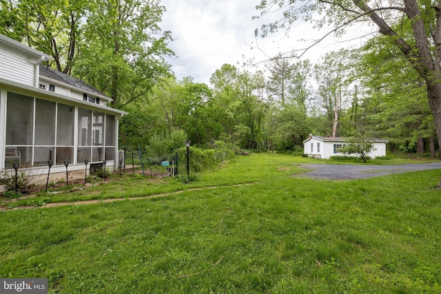 3909 Stoney Creek Rd, Edinburg, VA 22824 - view of green lawn featuring a sunroom