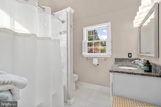 full bathroom with tile patterned flooring, vanity, baseboards, toilet, and a shower with shower curtain