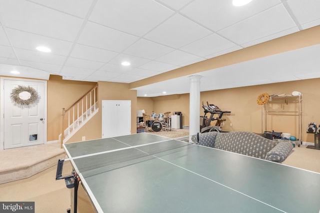 game room with recessed lighting and a paneled ceiling