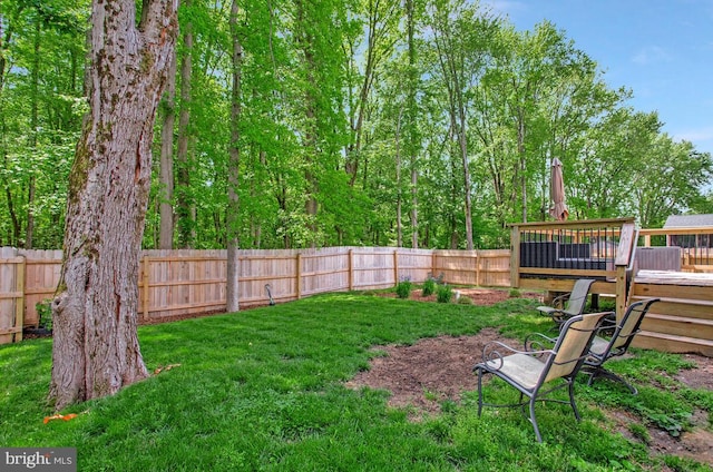 view of yard featuring a deck