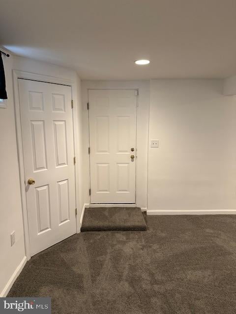 interior space with baseboards, carpet, and recessed lighting