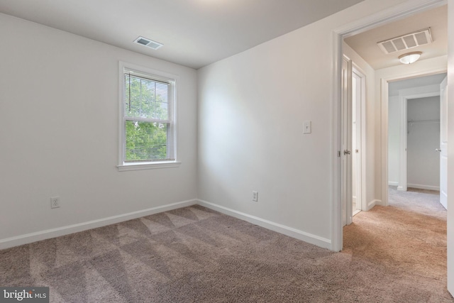 2512 Kent Village Dr, Landover, MD 20785 - spare room featuring light colored carpet and baseboards