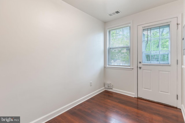2512 Kent Village Dr, Landover, MD 20785 - entryway with dark wood-style floors and baseboards