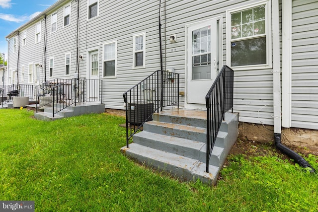 2512 Kent Village Dr, Landover, MD 20785 - entrance to property featuring a lawn and central AC