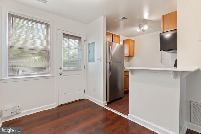 2512 Kent Village Dr, Landover, MD 20785 - kitchen featuring freestanding refrigerator, electric panel, dark wood-type flooring, baseboards, and a peninsula