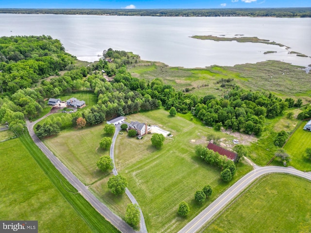 aerial view of property's location featuring a large body of water