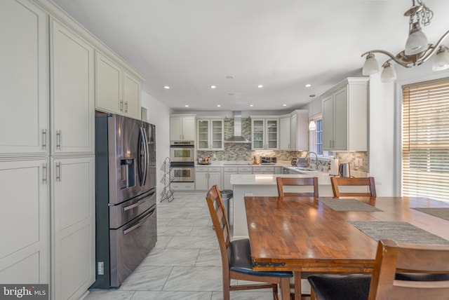 dining space with light marble finish floors and recessed lighting