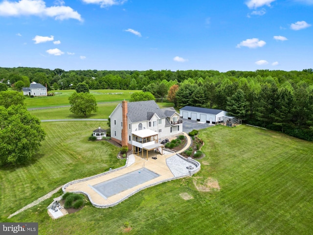 view from above of property featuring a forest