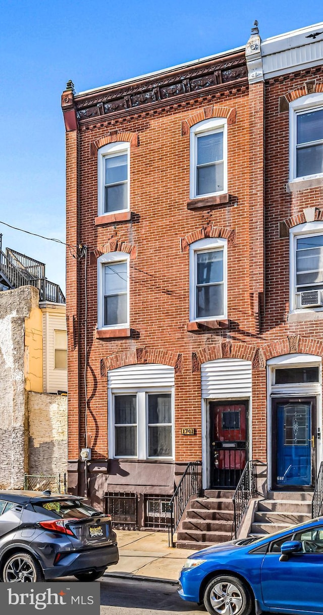 1741 Moore St, Philadelphia, PA 19145 - view of property featuring brick siding and entry steps