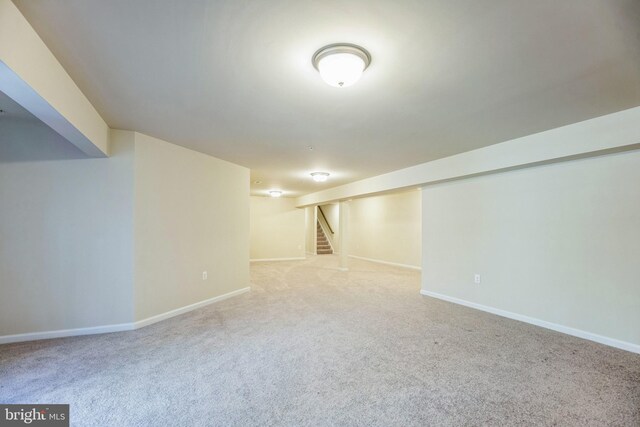 7438 Wildseed Pl, Hughesville, MD 20637 - finished basement featuring baseboards, carpet, and stairs