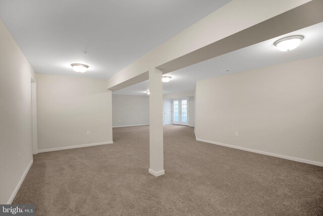 7438 Wildseed Pl, Hughesville, MD 20637 - below grade area with baseboards and carpet flooring