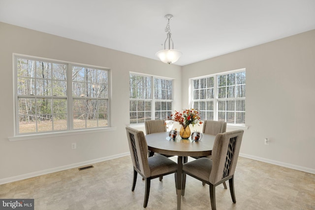7438 Wildseed Pl, Hughesville, MD 20637 - dining space with baseboards, visible vents, and plenty of natural light