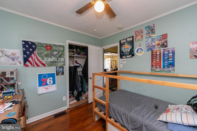 43 Churchill Rd, Cherry Hill, NJ 08034 - bedroom featuring crown molding, visible vents, a closet, wood finished floors, and baseboards